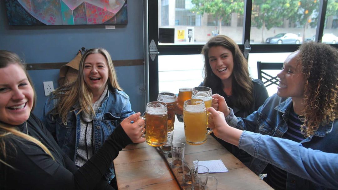 Group celebrating with beer