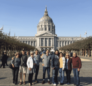 charles-minibus-tour-guide-dylans-tours Group Photo in front of San Francisco City Hall on SF City Tour