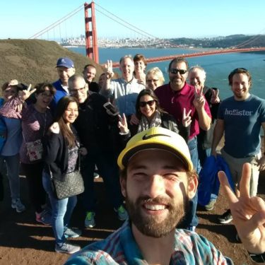 marlin-minibus-tour-guide-dylans-tours Tour Guide and Group on tour of San Francisco with Dylan's