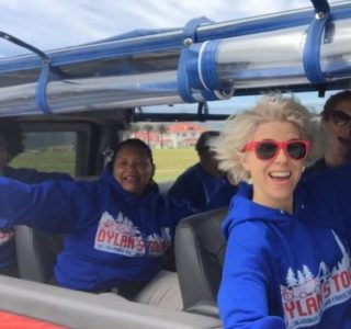 sam-bike-tour-guide-dylans-tours Group on Open-air Bus Tour of San Francisco