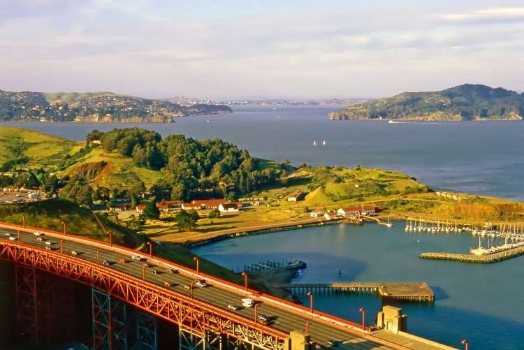 aerial view of sausaltio and the golden gate bridge in warm light