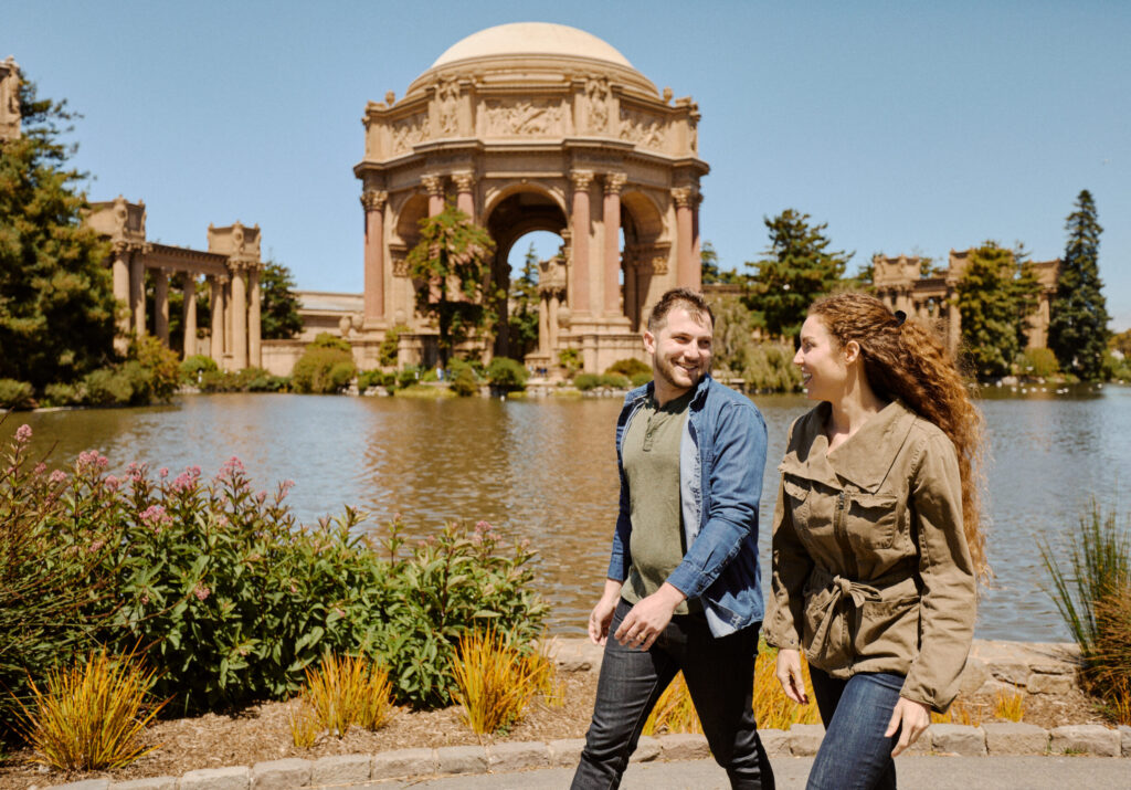 Couple Walking in Front of Palace of Fine Arts in San Francisco