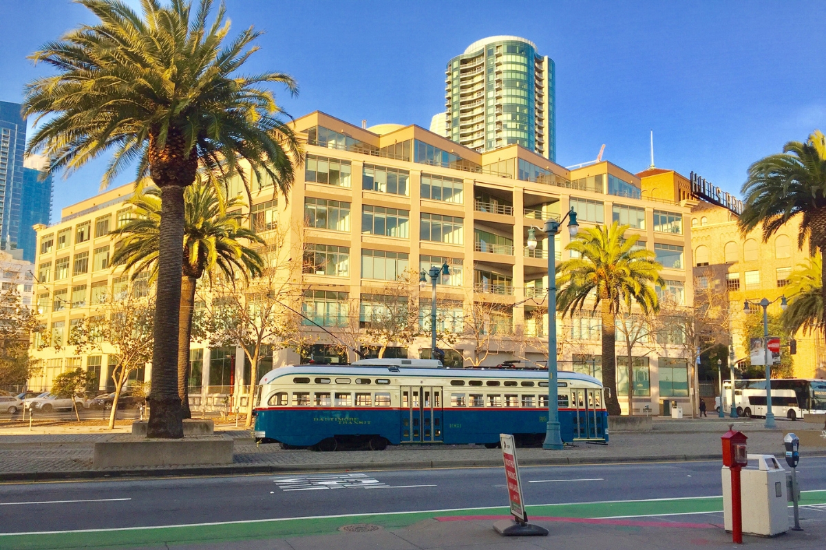 SFO public transit, vintage streetcar in downtown San Francisco, urban landscape