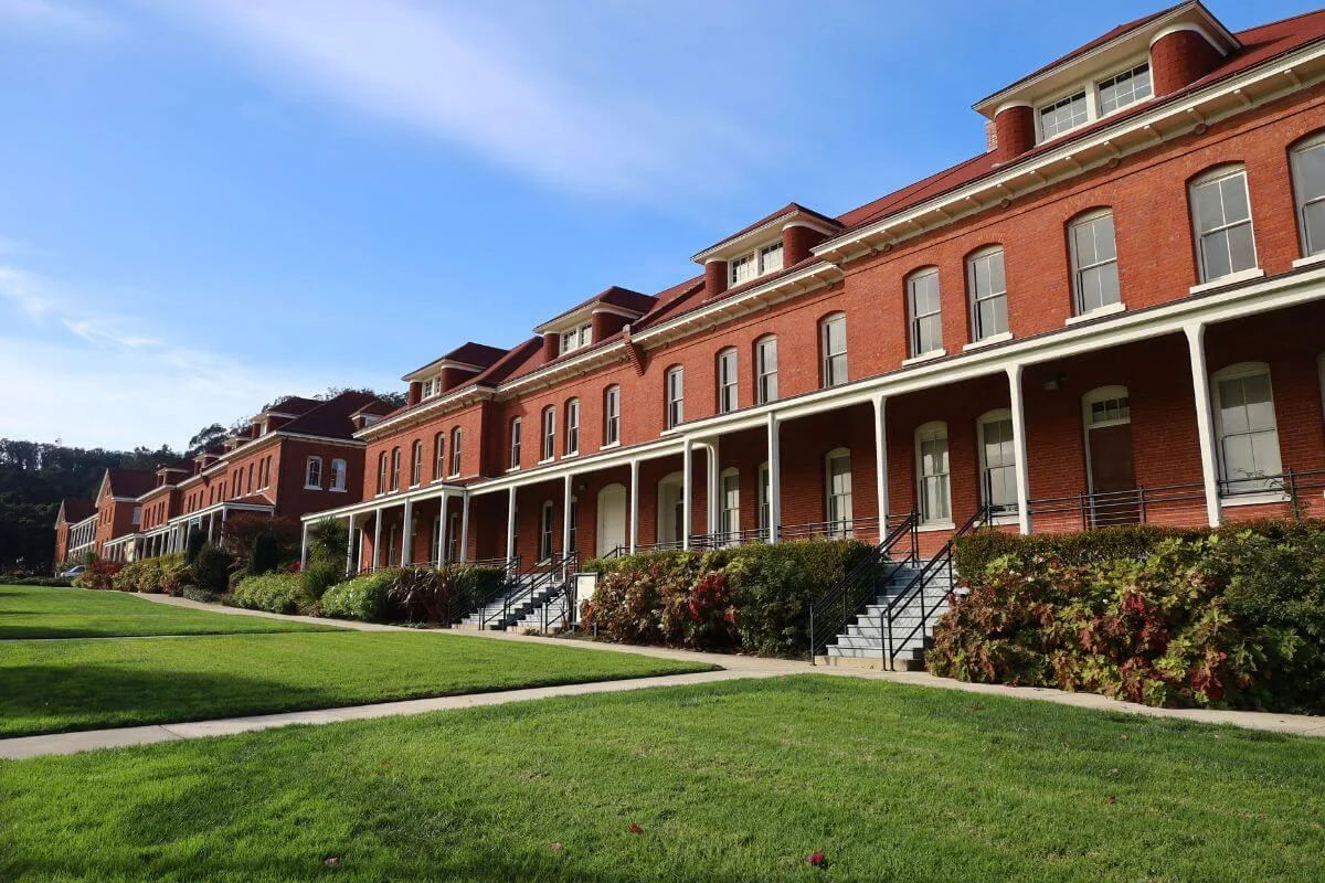 Row of red brick Montgomery Street Barracks at the Presidio's Main Post, the historic military buildings that now house the Lodge at the Presidio