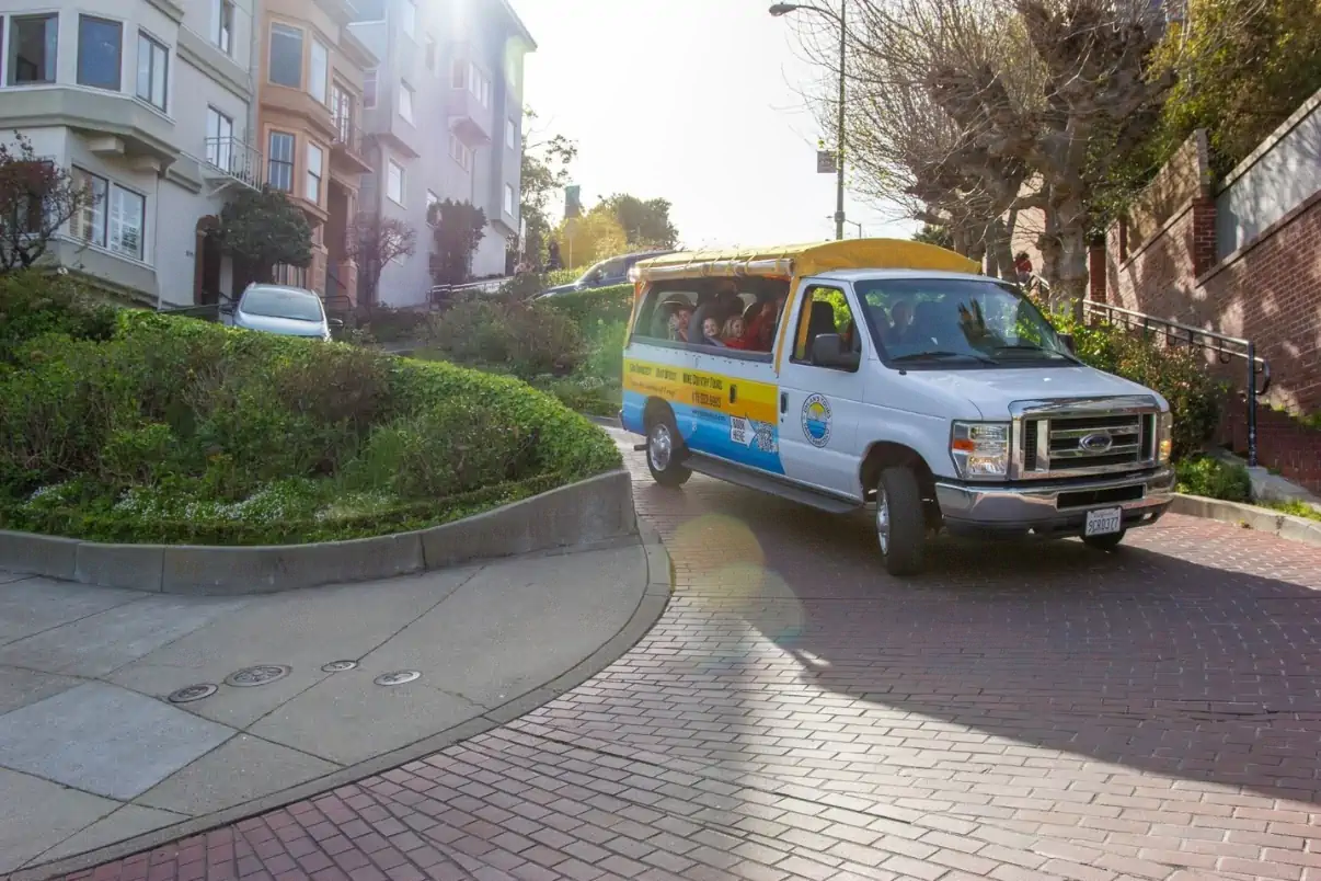 Dylan's Tours van driving down Lombard Street, San Francisco