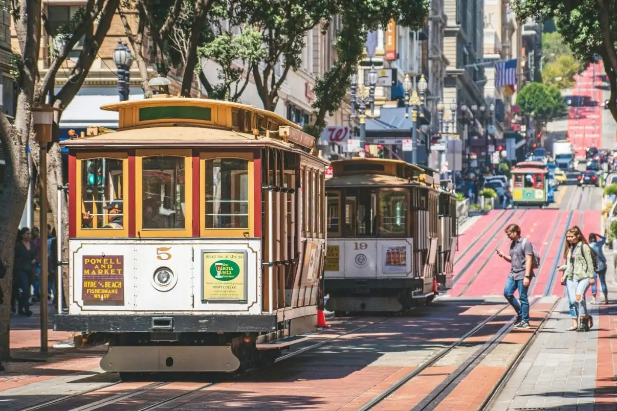 Historic San Francisco cable car traveling through downtown