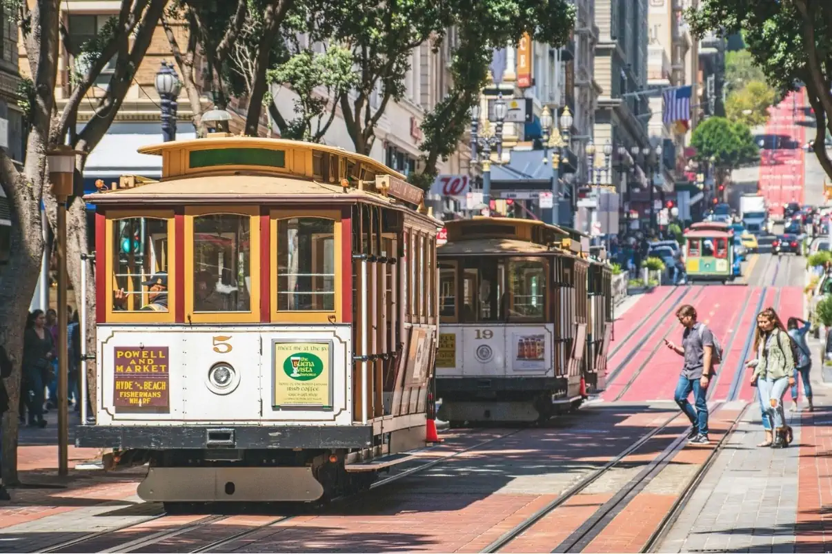 Historic cable car traveling along Powell Street in San Francisco