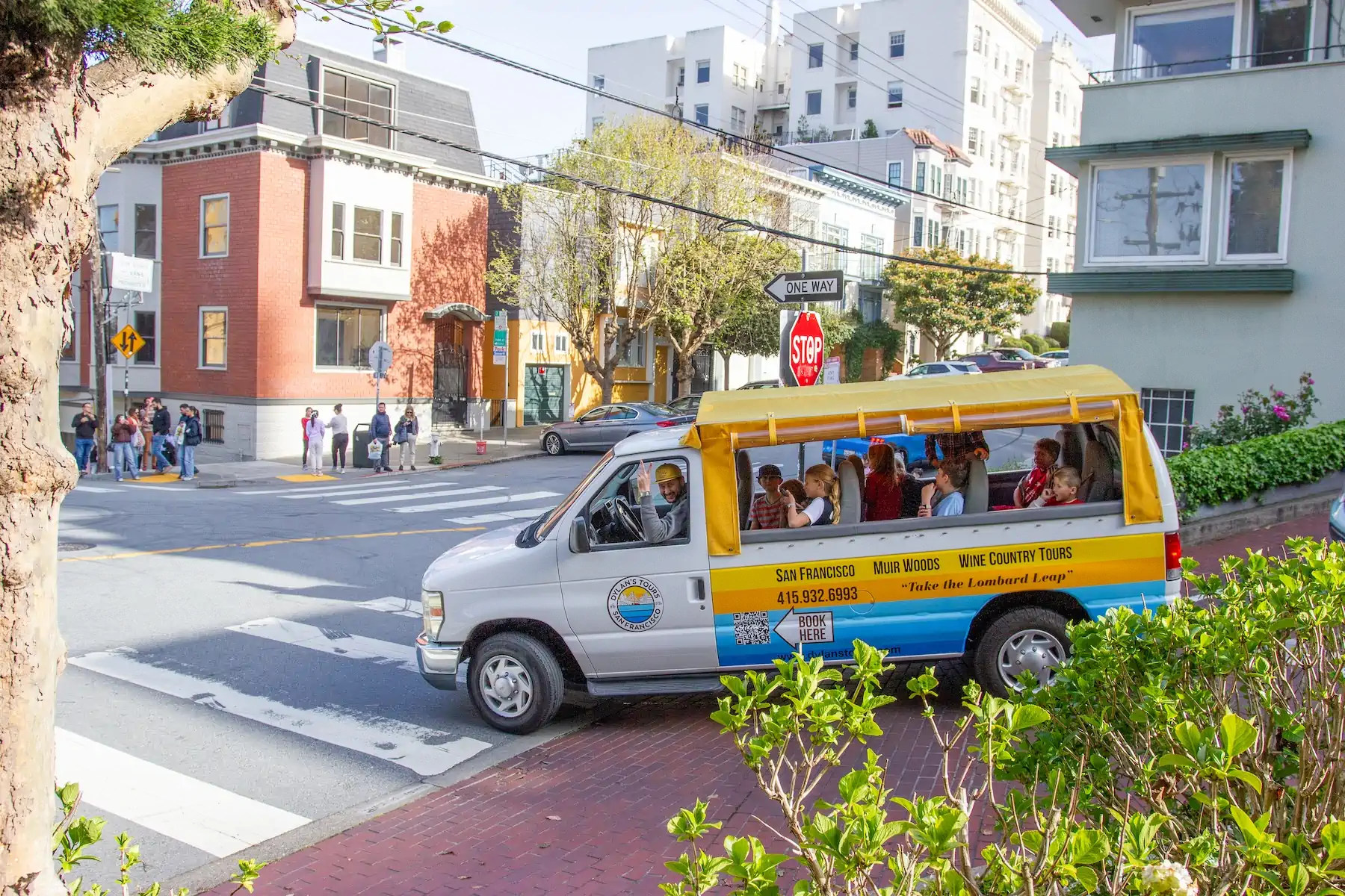 Dylan’s Tours open-air tour van with passengers in San Francisco